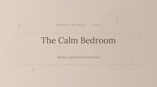 Serene minimalist bedroom with soft linen bedding and warm amber bedside light — Japandi bedroom wellness guide by TerraNest Studio
