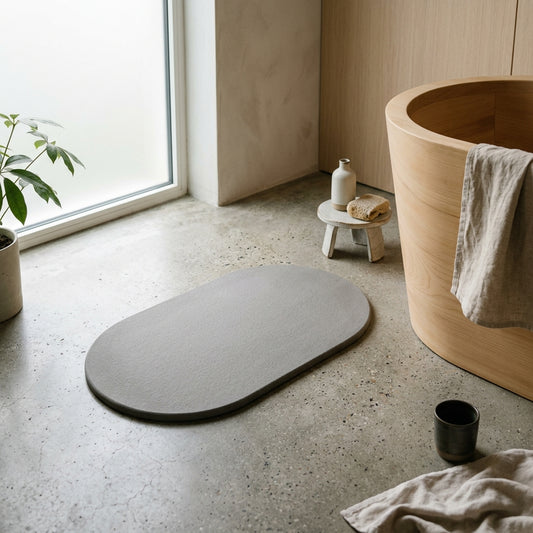 Minimalist Stone Gray Diatomaceous Earth Bath Mat on Japandi bathroom floor