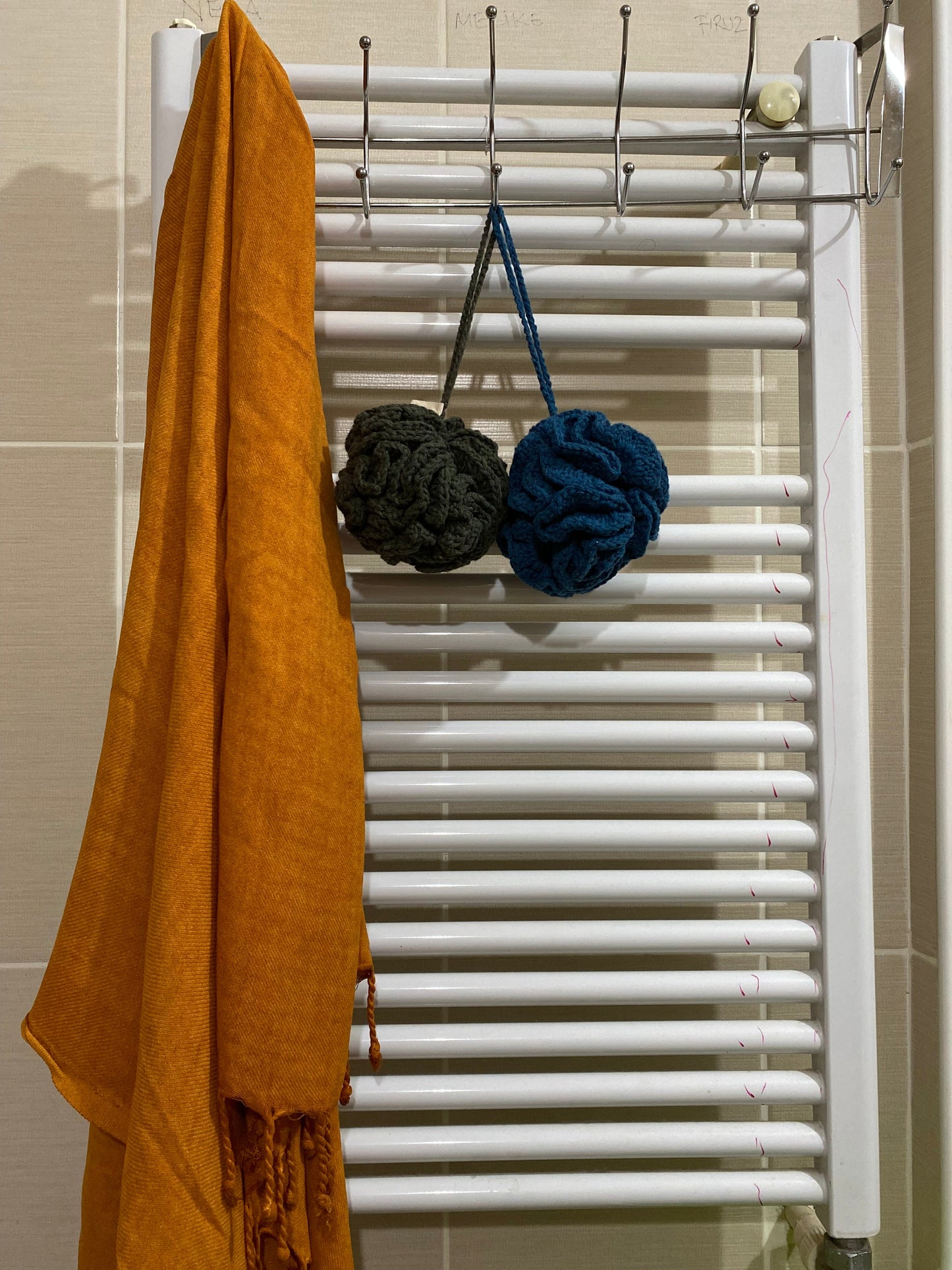 The Lefe Shower Flower — 100% Cotton Zero-Waste Sponge in minze, flat lay, with other eco-friendly products