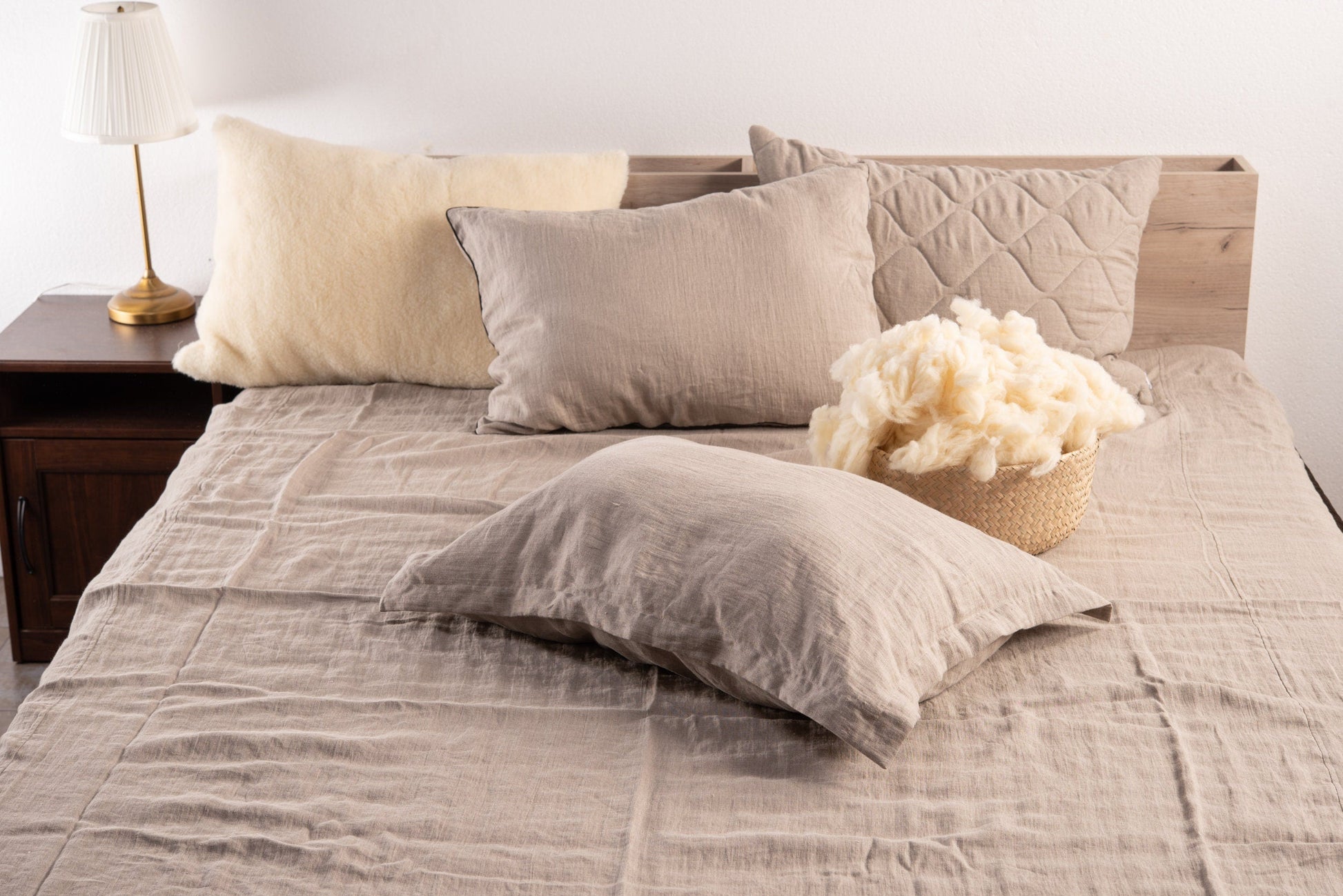 Close-up of raw merino wool filling inside the pillowcase